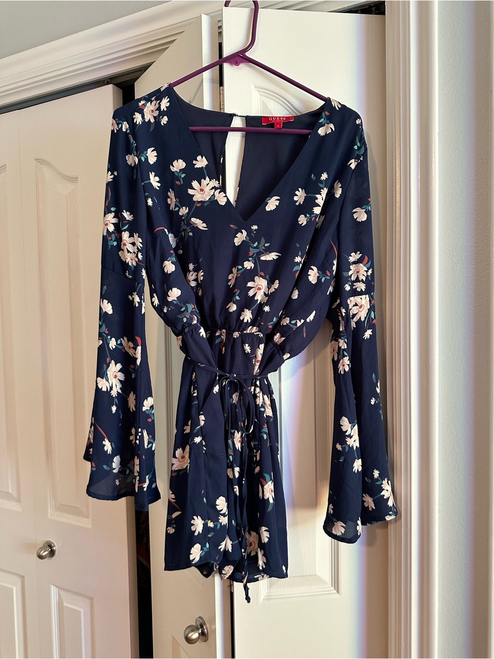 Navy Floral Wrap Romper with Bell Sleeves
